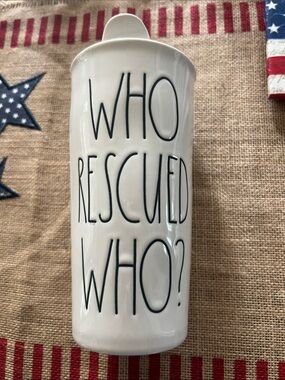 Rae Dunn Travel Mug with 'WHO RESCUED WHO?' Text